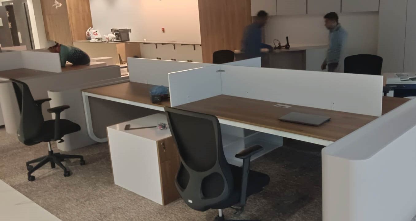 Office desks and cubicles in row.